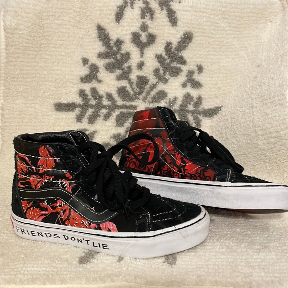 Vans “Stranger Things” high top sneakers.